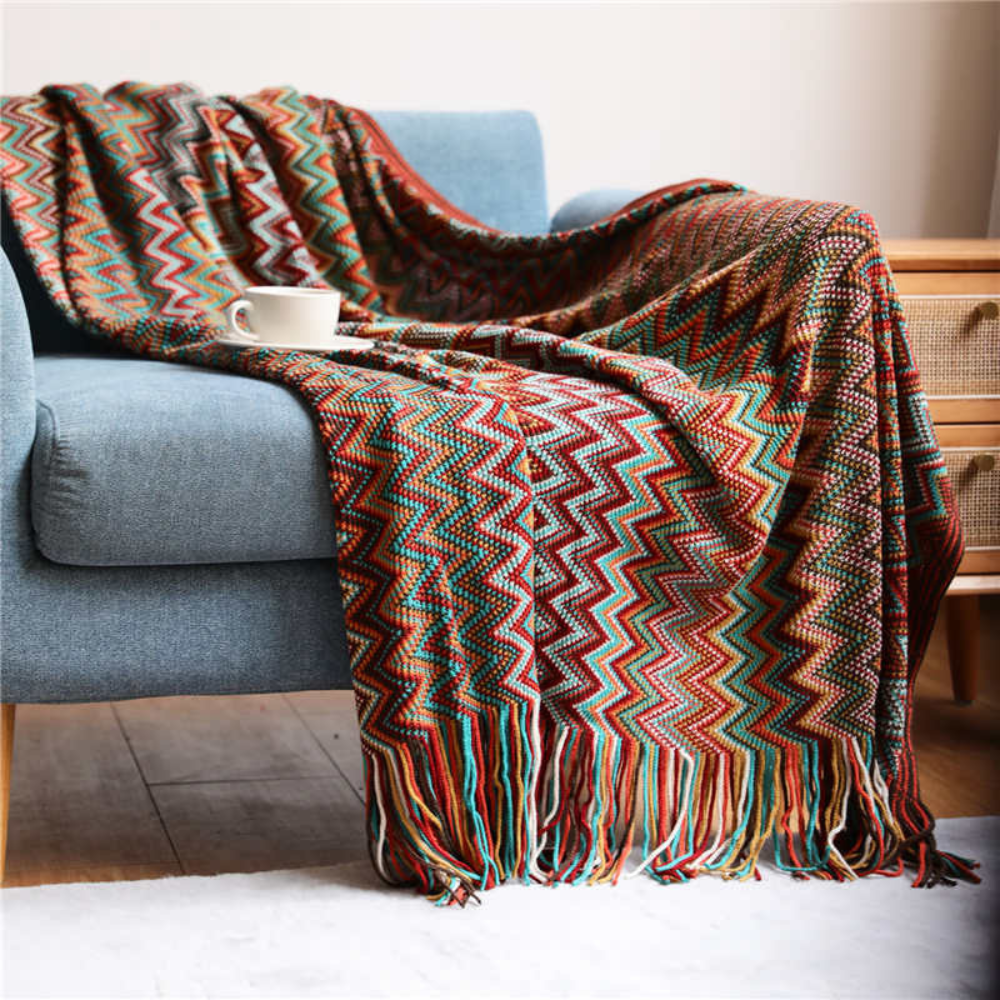 Plaid tricoté zigzag coloré avec pompons - Décoration intérieure cosy