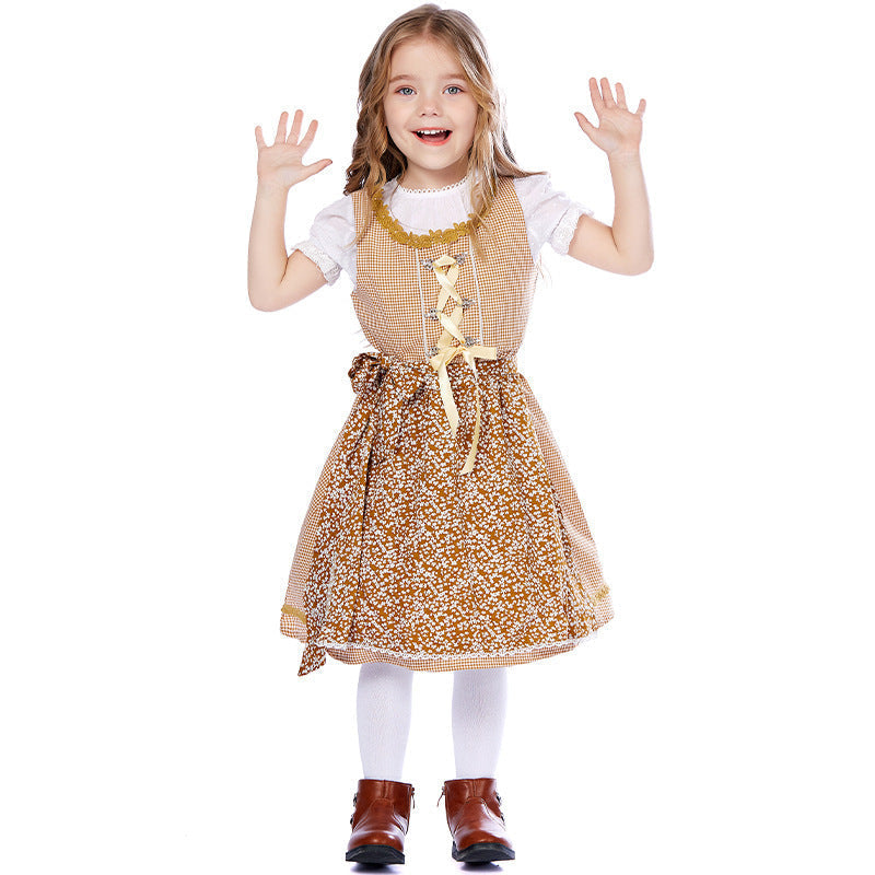 Traditionelles Kleid für Mädchen mit Schürze und Bluse mit Puffärmeln