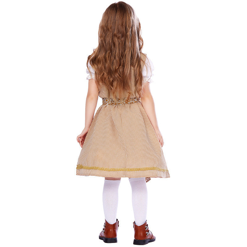 Traditionelles Kleid für Mädchen mit Schürze und Bluse mit Puffärmeln