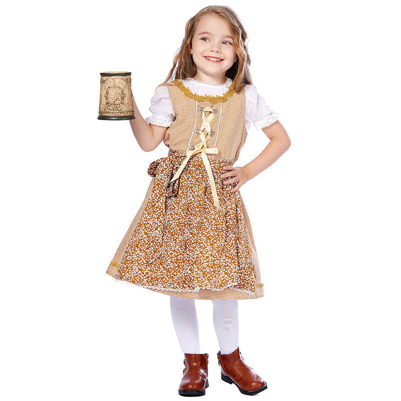 Traditionelles Kleid für Mädchen mit Schürze und Bluse mit Puffärmeln